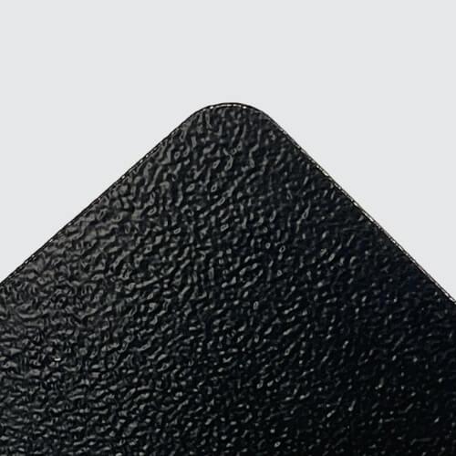 Metal surface with black powder coating finish