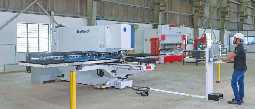 CNC punching process for sheet metal fabrication at Mech Power.